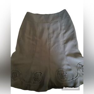 Chapter One, cocktail length black skirt